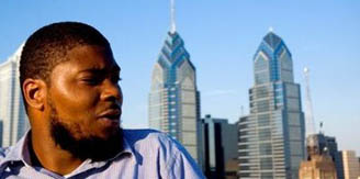 Photo of Reef the Lost Cause in front of Philly skyline